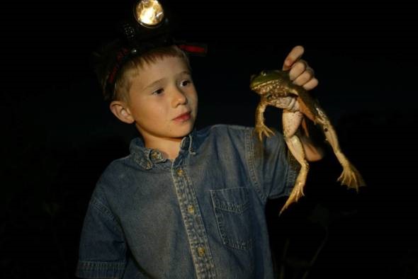 A young boy frogging.
