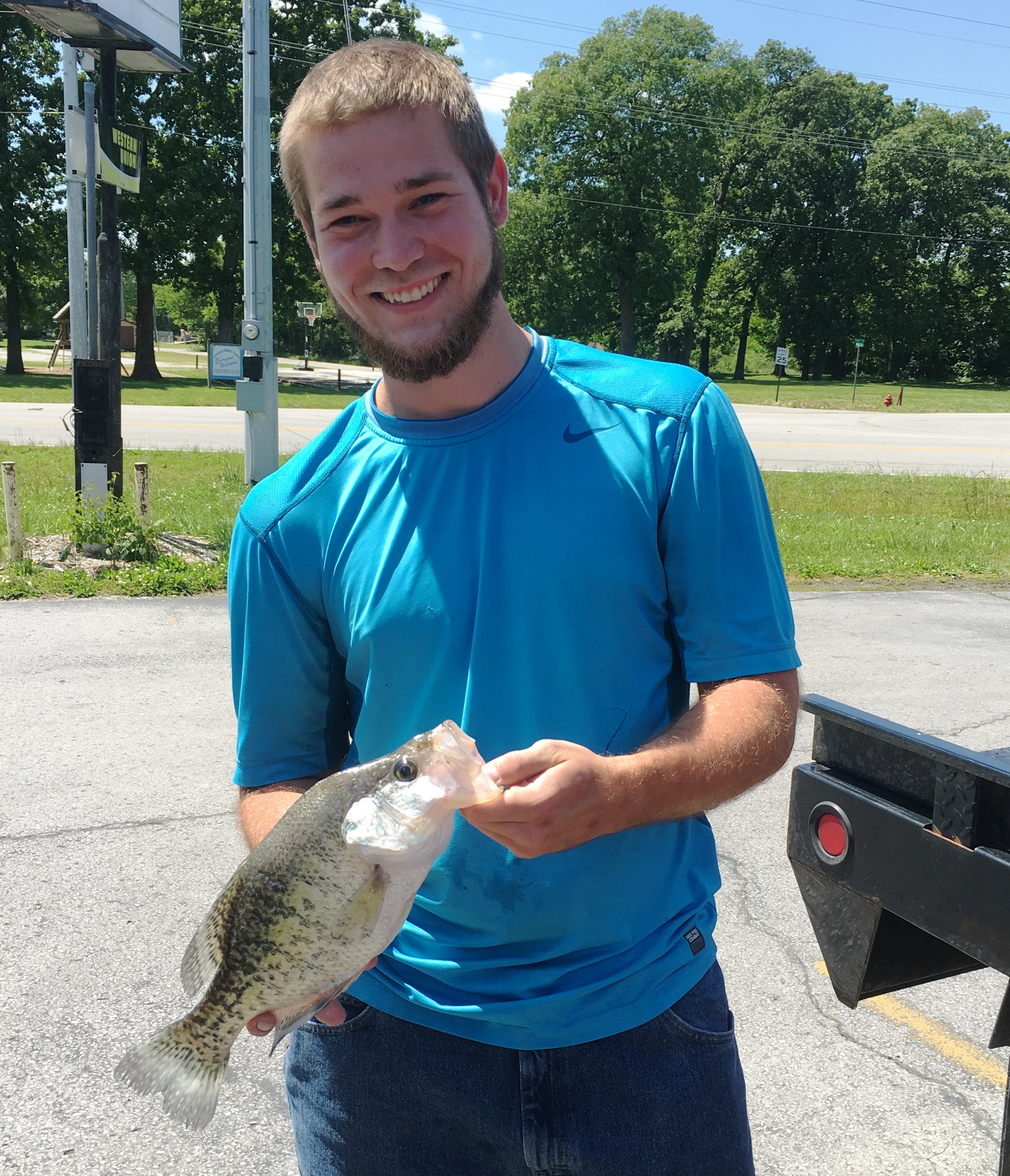 Colby Conn holding up his state-record white crappie