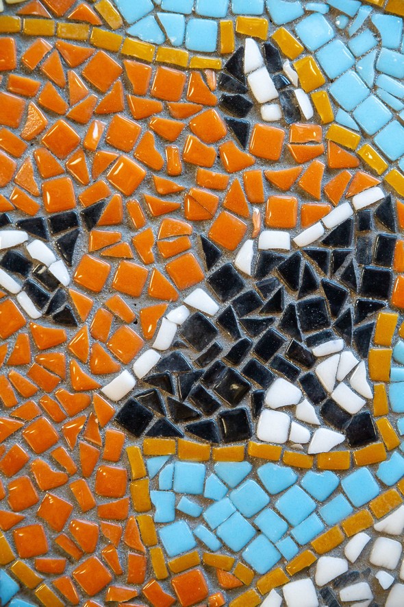 hand-made mosaic tile MDC logo closeup