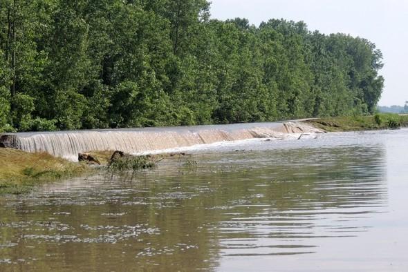 Water flowing over the levee in 2013