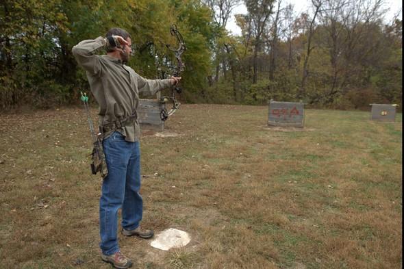 Archer shoots at target