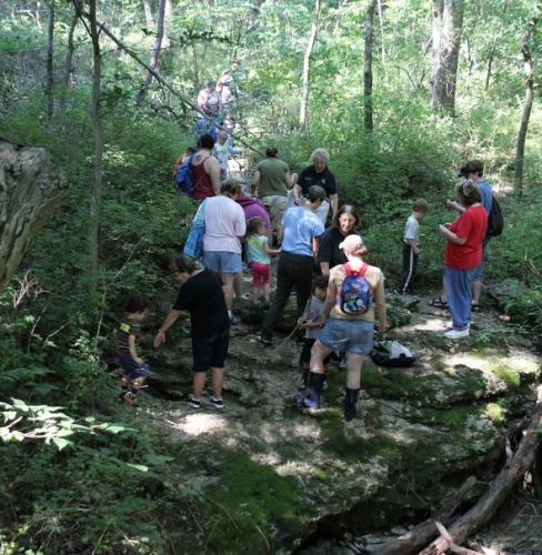 MDC staff take visitors on a nature hike