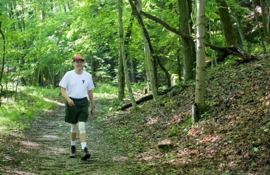 Man hiking through woods