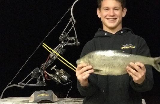 Jacob Morgan poses with his record-breaking gizzard shad.