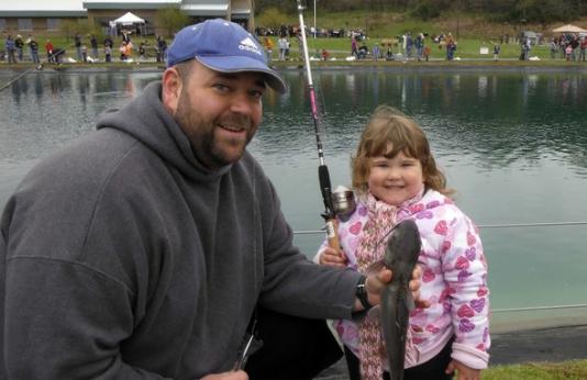 Kids catching fish at Lost Valley Hatchery's Kids Free Fishing Day.