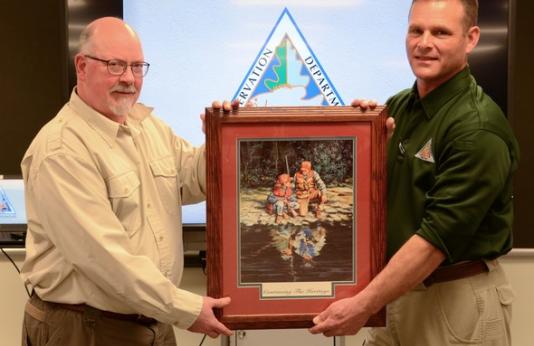 Richard Remmler get hunter education award