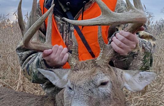 Tony Peters poses with a buck he harvested during a mentored hunt in Putnam County.
