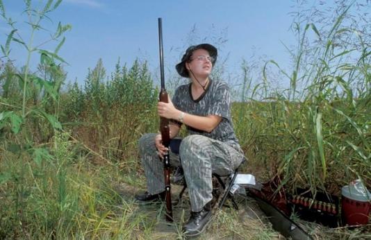 A dove hunter sits in wait for a dove.